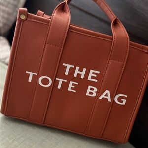 Brown Tote Bag with White Text